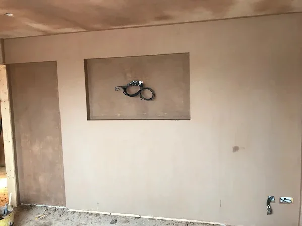 Media wall skimmed flat with the recess squared up, ready for decoration