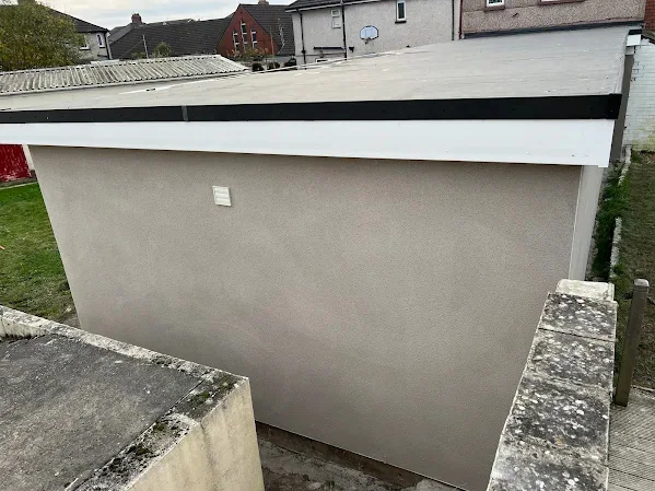 Rendered garage wall close up, the finish flat from end to end