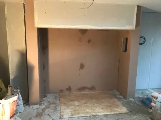 Chimney breast boarded, beaded and skimmed with a clean square recess