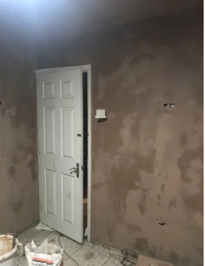 Hallway skimmed out around an existing door lining