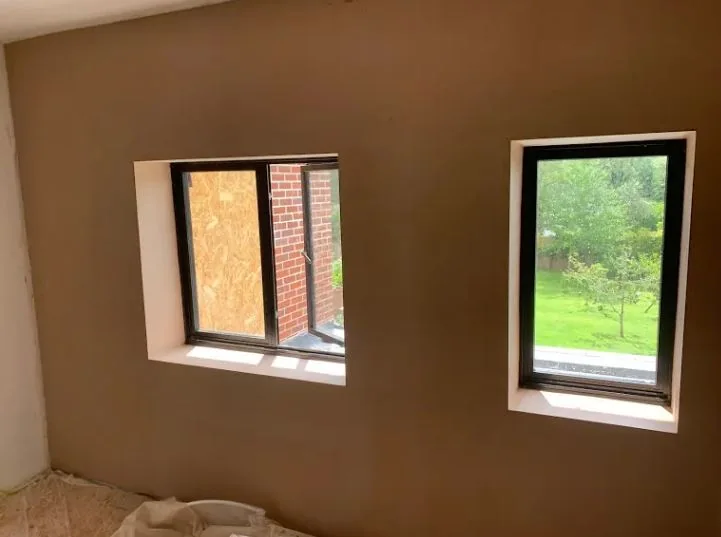Room skimmed with two new window openings formed and beaded