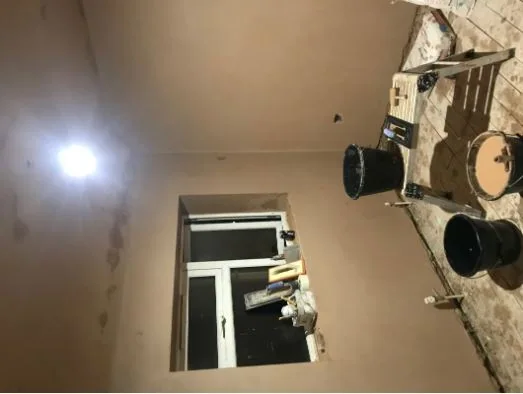 Landing ceiling skimmed above an open stairwell